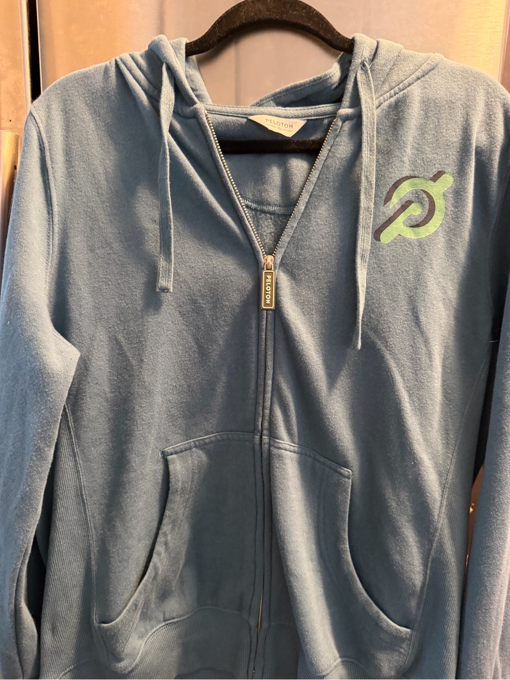 Peloton Light Blue Zip Hoodie with Green Logo